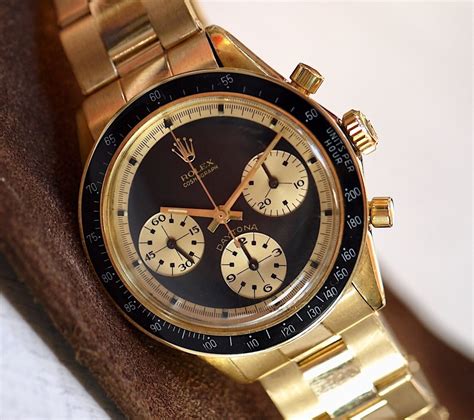 rolex daytona paul newman gold for sale|who bought Paul Newman daytona.